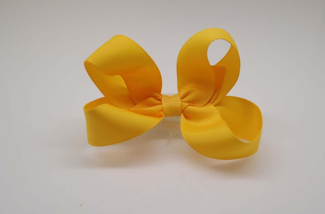 Large pinwheel hair Bow with colors  Gold